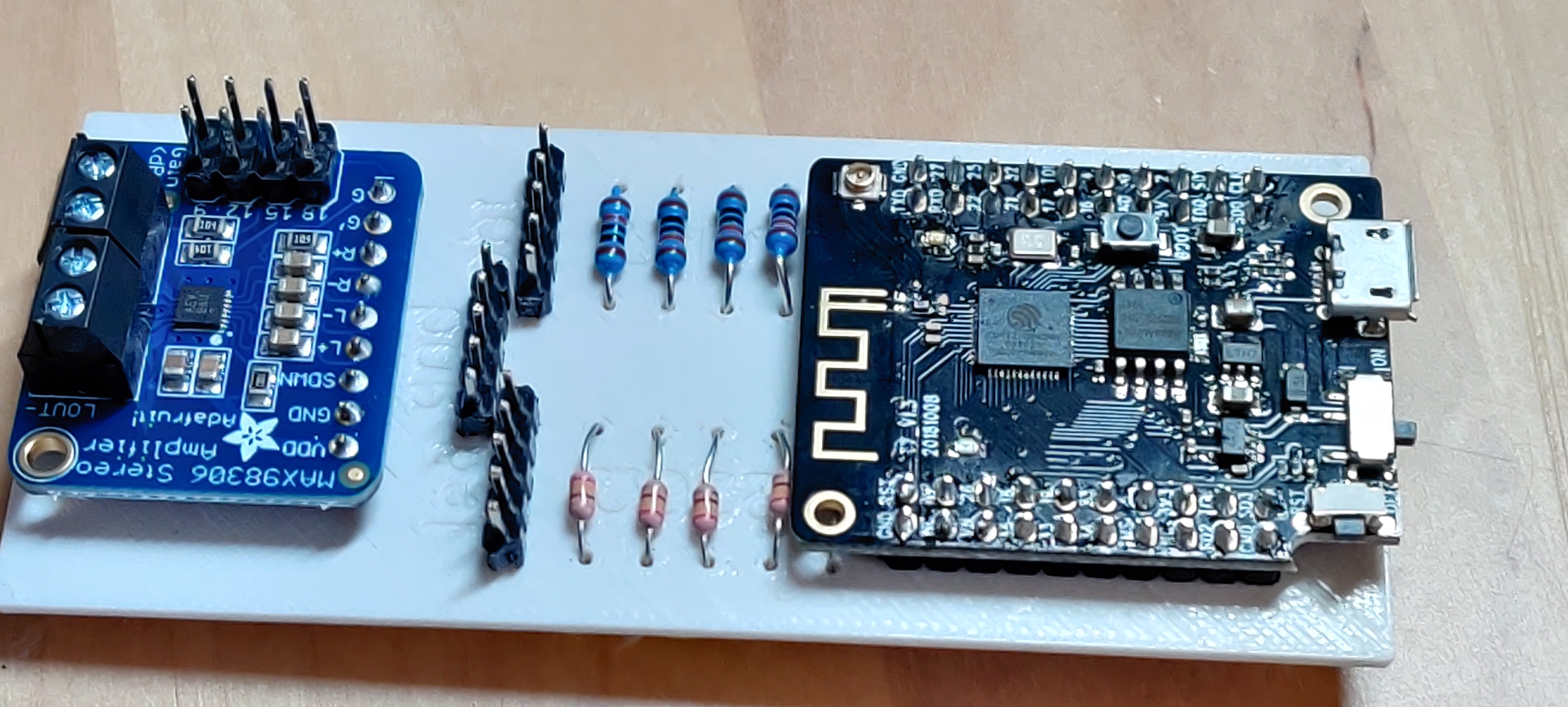 same board, with all the components placed on it. The "led",
"gnd" and "pht" holes hold connectors